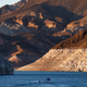A bathtub ring of light minerals shows the high water line near Hoover Dam on Lake Mead.